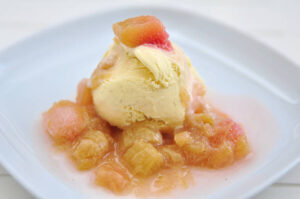 Spring-Inspired Ice Cream Recipes To Celebrate Mother’s Day image 5 Rhubarb amd ginger ice cream on braised rhubarb Frosted fusions
