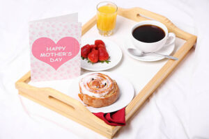 Spring-Inspired Ice Cream Recipes To Celebrate Mother’s Day image 7 tray of breakfast with flowers amd happy mothers day card Frosted Fusions