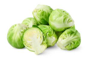 Brussels Sprout Ice Cream – The Next Gourmet Sensation image 2 handful of Brussels one sliced to show inner leaves white background Frosted Fusions