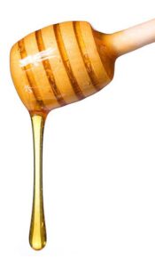 Cherry-Blossom-Honey-Sorbet-–-A-Delicate-Spring-Recipe-image-4-honey-dripping-off-a-honey-drizzler-Frosted-Fusions Cherry-Blossom-Honey-Sorbet-–-A-Delicate-Spring-Recipe-image-4-honey-dripping-off-a-honey-drizzler-Frosted-Fusions