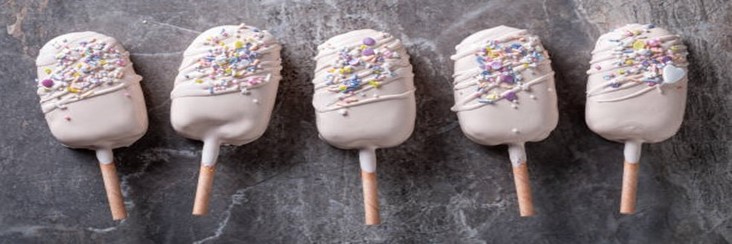 Frozen Yoghurt Lollies For Easter – A Lighter, Healthier Treat featured image 207x620w line of frozen yoghurt lollies lightly decorated dark marble background Frosted Fusions