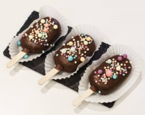 Frozen Yoghurt Lollies For Easter – A Lighter, Healthier Treat image 4 chocolate covered frozen yoghurt lollies with sprinkles Frosted Fusions