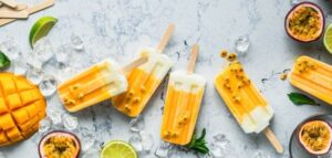 Frozen Yoghurt Lollies For Easter – A Lighter, Healthier Treat image 4 mango frozen yoghurt lollies with fresh mango passion fruit and lime Frosted Fusions