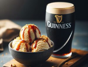 Homemade Guinness Ice Cream – A Bold Frozen Fusion Image 2 a bowl of Guinness Ice Cream with caramel sauce drizzled and a glass og Guinness on wooden board Frosted Fusions
