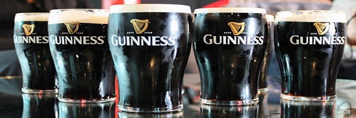 Homemade Guinness Ice Cream – A Bold Frozen Fusion featured image 207x620w glasses of guinness lined up Frosted Fusions