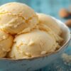 Honey, Yoghurt & Toasted Almond Ice Cream – A Naturally Sweet Scoop featured image 637x1920w bowl of honmey ice cream with a glass jar of honey dish of yoghurt and fresh almonds to the side Frosted Fusions