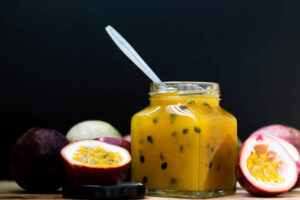 The Easter Ice Cream Egg Illusion A Fun Unexpected Easter Treat Image 9 jar of passion fruit pulp with fresh passion fruits Frosted Fusions