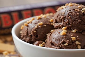 Tribute To Dark Chocolate Toblerone – Make Your Own Homemade Ice Cream Version featured image 2 637x1920w dark chocolate Toblerone with a bow of chocooate and nougat ice cream Frosted Fusions