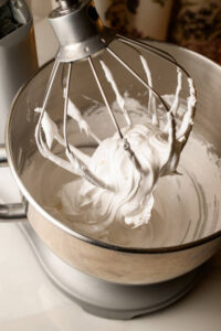 Troubleshooting-Tips-And-Tricks-For-No-Churn-Ice-Cream-image-1-double-cream-whipped-in-a-mixing-bowl-Frosted-Fusions Troubleshooting-Tips-And-Tricks-For-No-Churn-Ice-Cream-image-1-double-cream-whipped-in-a-mixing-bowl-Frosted-Fusions