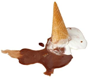 Troubleshooting-Tips-And-Tricks-For-No-Churn-Ice-Cream-image-4-ice-cream-scoop-in-waffle-cone-melting-and-too-runny-Frosted-Fusions