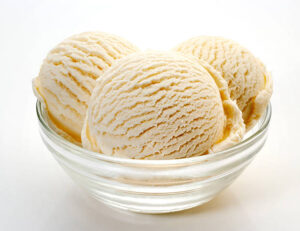 Troubleshooting Tips And Tricks For No-Churn Ice Cream image 7 scoops of vanilla ice cream in a bowl white background Frosted Fusions
