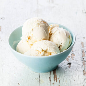Troubleshooting Tips And Tricks For No-Churn Ice Cream image 8 bowl of vanilla ice cream scoops Frosted Fusions