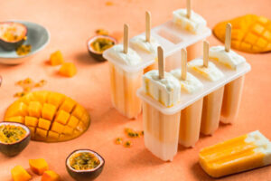 Fun-Easy-Homemade-Ice-Lollies-Popsicles-—-The-Perfect-Summer-Treat-image-2-mango-and-passion-fruit-ice-lollies-with-fresh-mango-and-passion-fruit-Frosted-Fusions