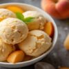 Homemade Peach Ice Cream And Lollipops Recipes Featured Image 2 637x1920w Bowl of Peach ice cream and peach lollipops with fresh peaches to the side Frosted Fusions